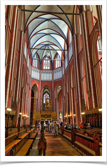 Long view of the nave toward the altar. This end has catholic services.